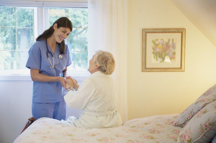 Nurse and Elderly Patient
