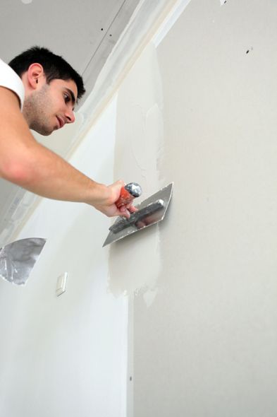 plasterer working