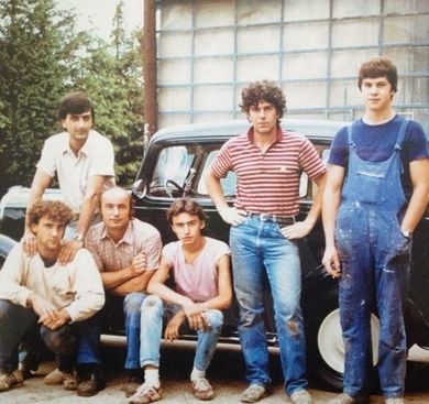 vecchia foto del team di meccanici professionisti