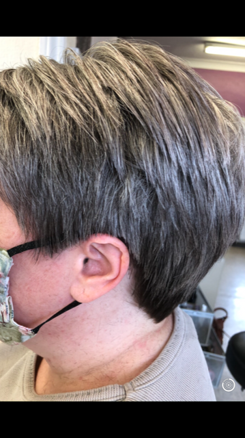 side view of a boy haircut