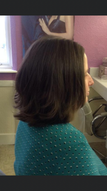 side view of a woman haircut