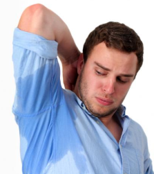 female sweating forehead