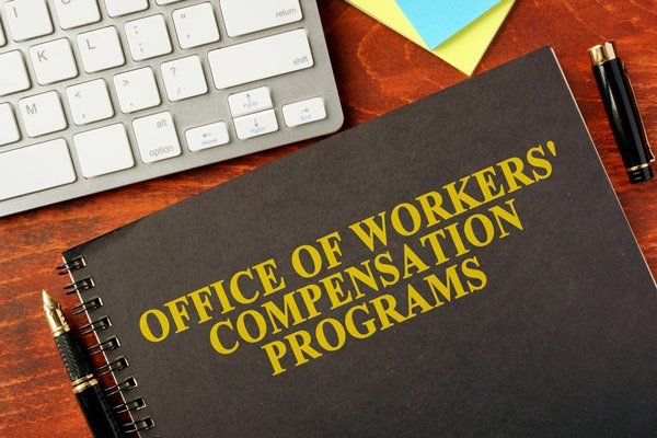 Workers Compensation Lawyer — Book with title Office of Workers' Compensation Programs in Redding, CA Workers Compensation Lawyer — Book with title Office of Workers' Compensation Programs in Redding, CA