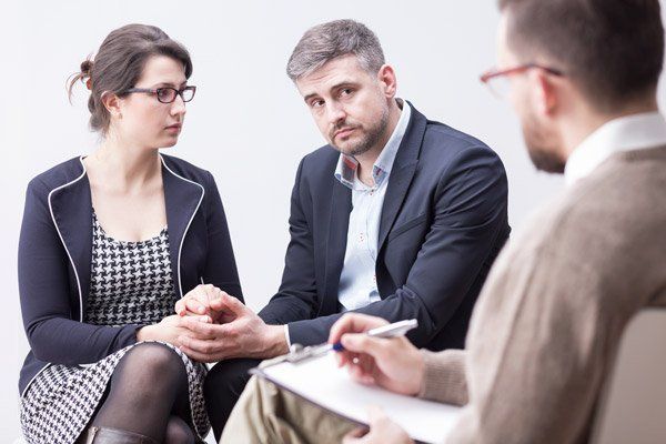Legal Consultation — Couple Having A Counseling With Attorney in Redding, CA Legal Consultation — Couple Having A Counseling With Attorney in Redding, CA