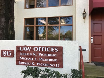 Law Office — Attorney Holding A Briefcase in Redding, CA Law Office — Attorney Holding A Briefcase in Redding, CA