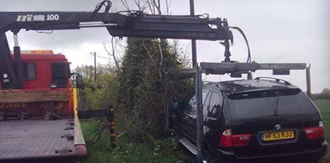 black car being recovered