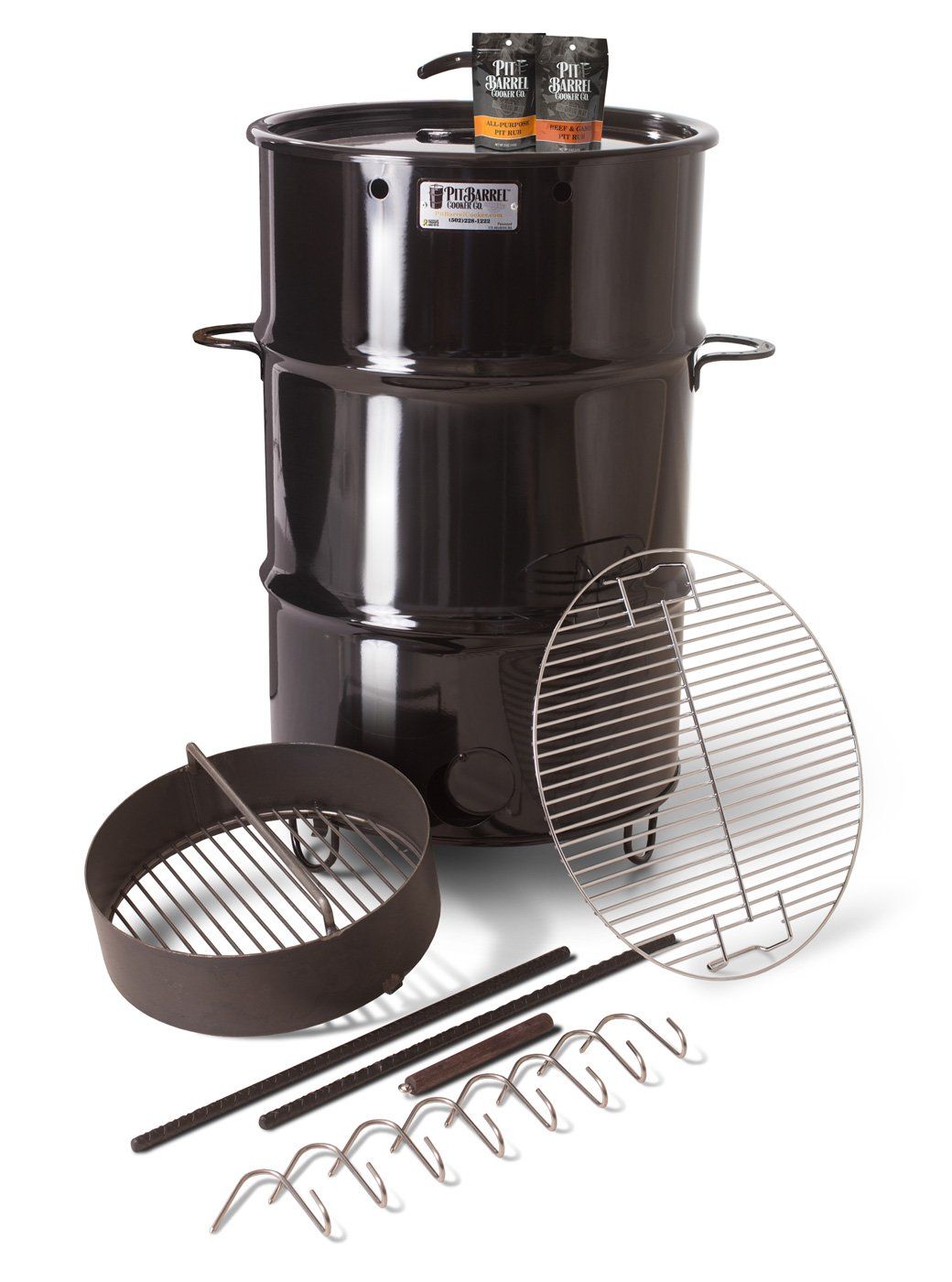 A black barrel with a grill attached to it