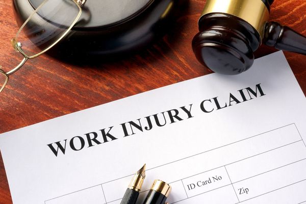 Lawyer — Work Injury Claim Form on a Table In Waynesville, NC Lawyer — Work Injury Claim Form on a Table In Waynesville, NC