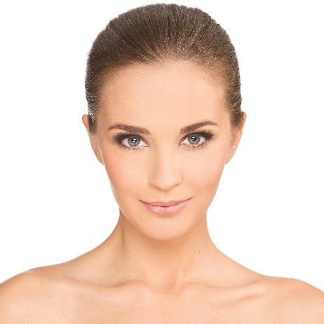 A close up of a woman 's face on a white background