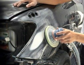 Amherst Collision Specialists Technician at work in Buffalo, NY