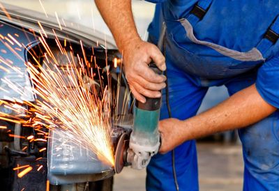auto collision buffalo specialist working on car