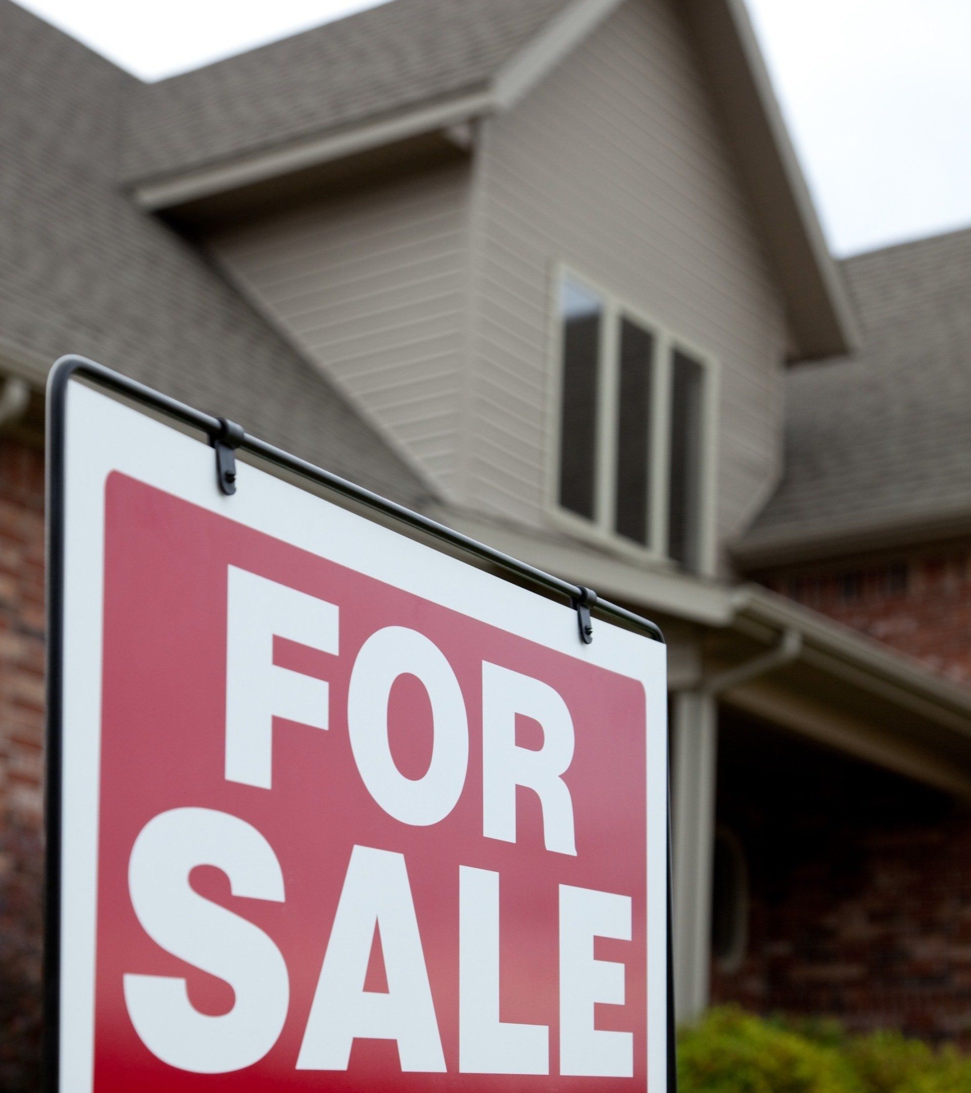 house with for sale sign