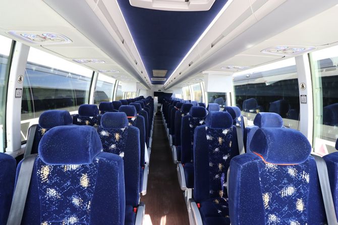 Man Relaxing In Seat Of Tour Bus — Mountain View Tours — Tucson, AZ