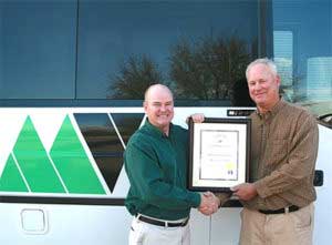 Safety — Two Man Shaking Hands While Holding An Award In Tucson, AZ Safety — Two Man Shaking Hands While Holding An Award In Tucson, AZ