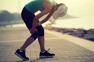 A Woman Suffering from a Muscle Pain — Solon, OH — Core Elite Wellness Fit Cryo LLC