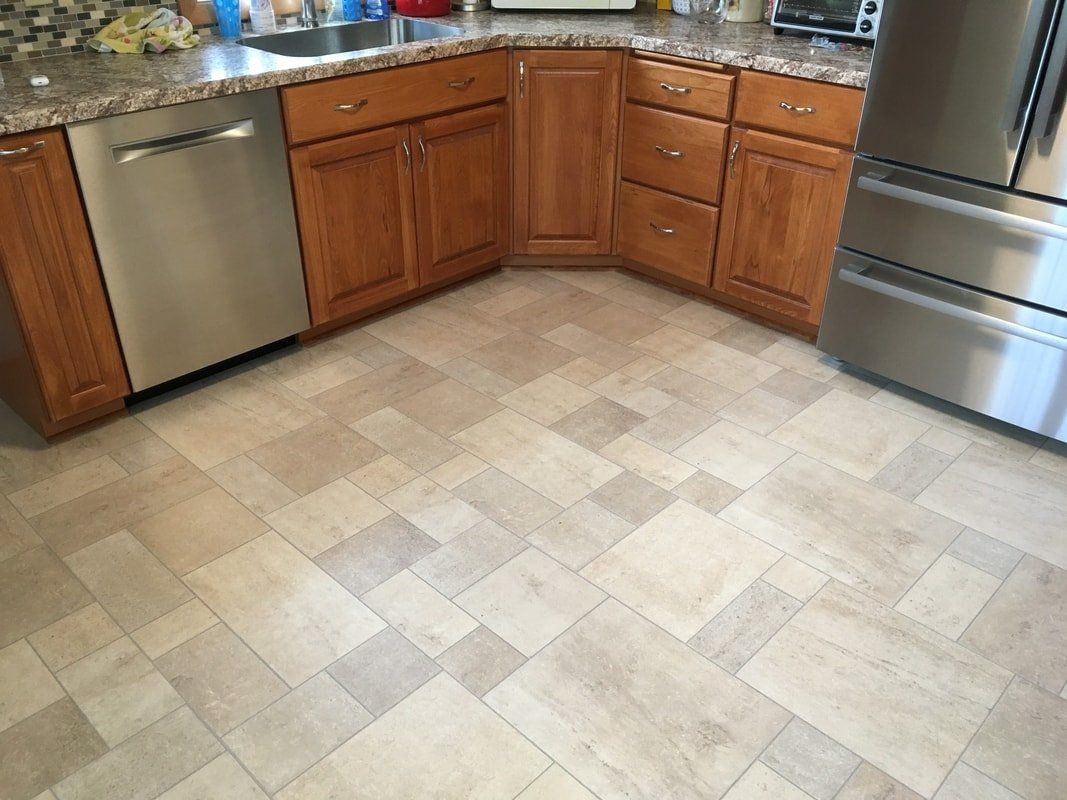 Kitchen with Counter Table — Laminate Flooring in Hamburg, NY