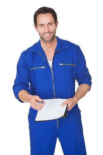 Automechanic Writing Invoice — Brake Service in Goldsboro, NC