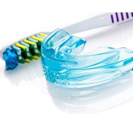 Toothbrush and Mouthpiece—Dentist in Moorpark, CA Toothbrush and Mouthpiece—Dentist in Moorpark, CA