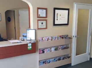 Smiling Mother with her Kids—Dentists in Moorpark, CA