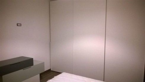 camera da letto con cassettiera