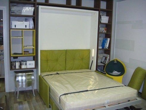 divano letto verde aperto