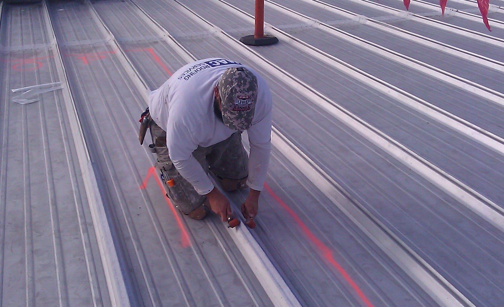 Man Fixing The Roof — Roofs in Las Vegas, NV