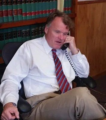 Man Having a Phone Call — Turners Falls, MA — Dolan & Dolan
