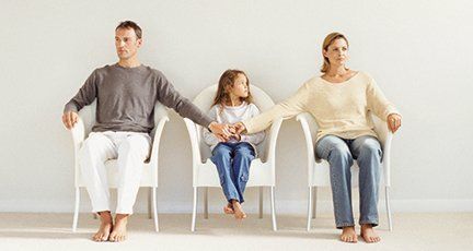 a couple and a child
