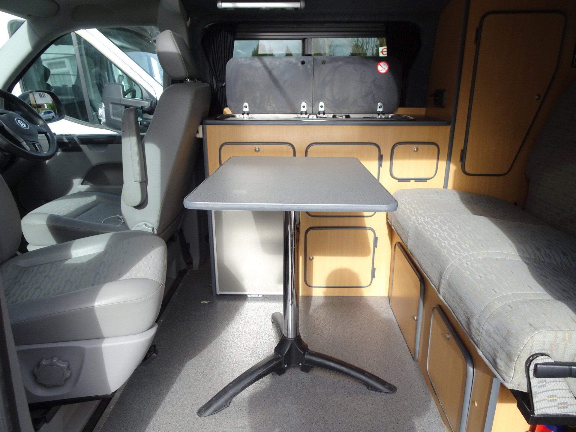 A small table in the back of a van