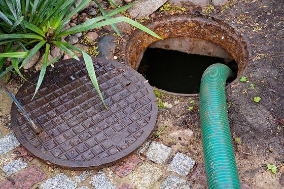 Pumping Septic Tanks from the Backyard — Atlanta, GA — Akins Plumbing Pumping Septic Tanks from the Backyard — Atlanta, GA — Akins Plumbing