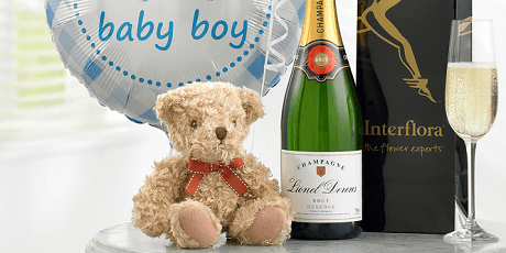 A bottle of champagne, a teddy and a