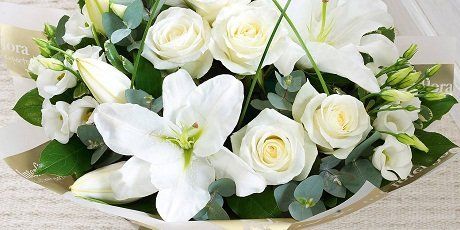 A white mixed-flower sympathy bouquet A white mixed-flower sympathy bouquet