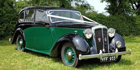 A green Daimler DB18 wedding car