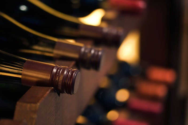 Wine Cellar — Bottles of wine on shelves in Baton Rouge, LA