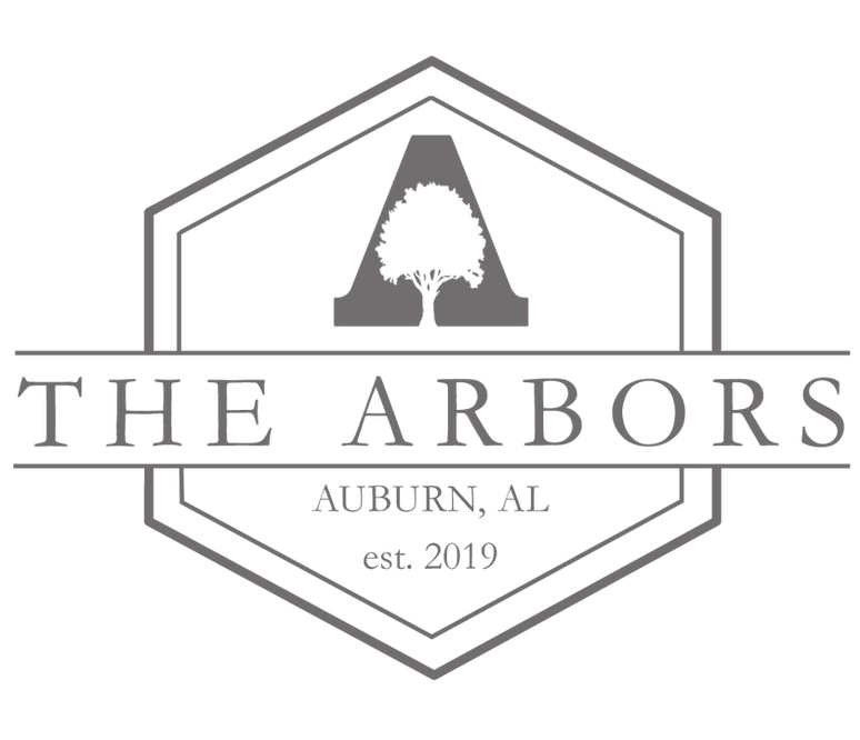 The Arbors Auburn, AL logo with hexagon outline, stylized tree, and “est. 2019” text