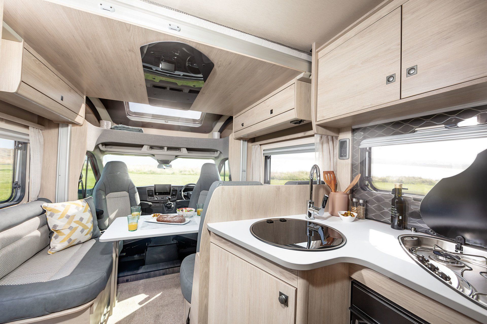 motorhome hire with a fixed rear island bed, motorhome rental, holidays in the uk and europe, luxury camping, autotrail tribute f74