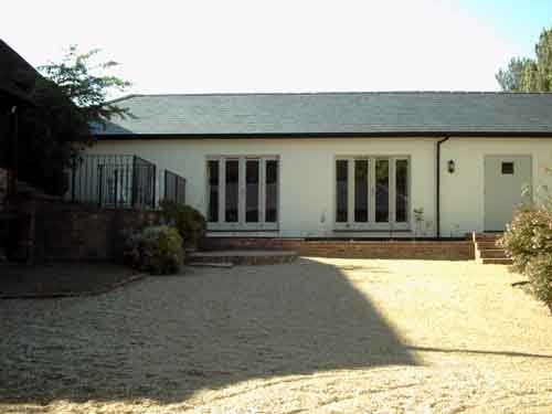 Exterior view of the farmhouse building