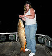 Woman Holding a Large Fish — Lancaster County, PA — Night Ventures Bowfishing Charters