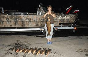 Woman Holding a Fish — Lancaster County, PA — Night Ventures Bowfishing Charters