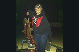 Woman Holding a Carp — Lancaster County, PA — Night Ventures Bowfishing Charters