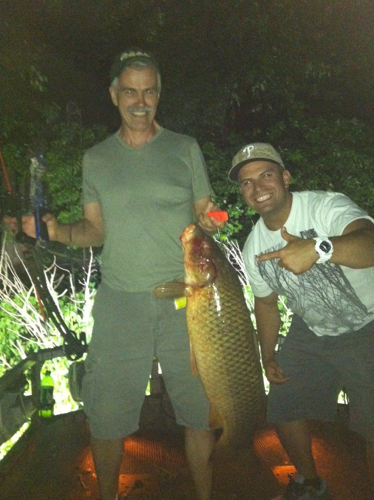 Two Men Happy with Caught Fish — Lancaster County, PA — Night Ventures Bowfishing Charters