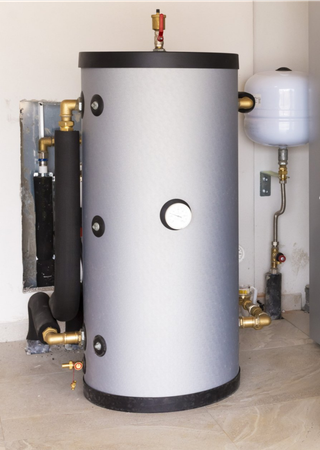 Combustion Analysis — Man Inspecting Heating Boiler in Essex, VT Combustion Analysis — Man Inspecting Heating Boiler in Essex, VT
