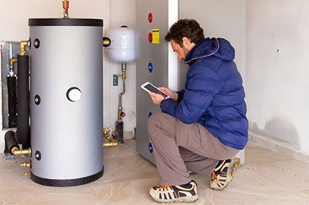Heating Company — Man Making the Consumption Metering in Essex, VT