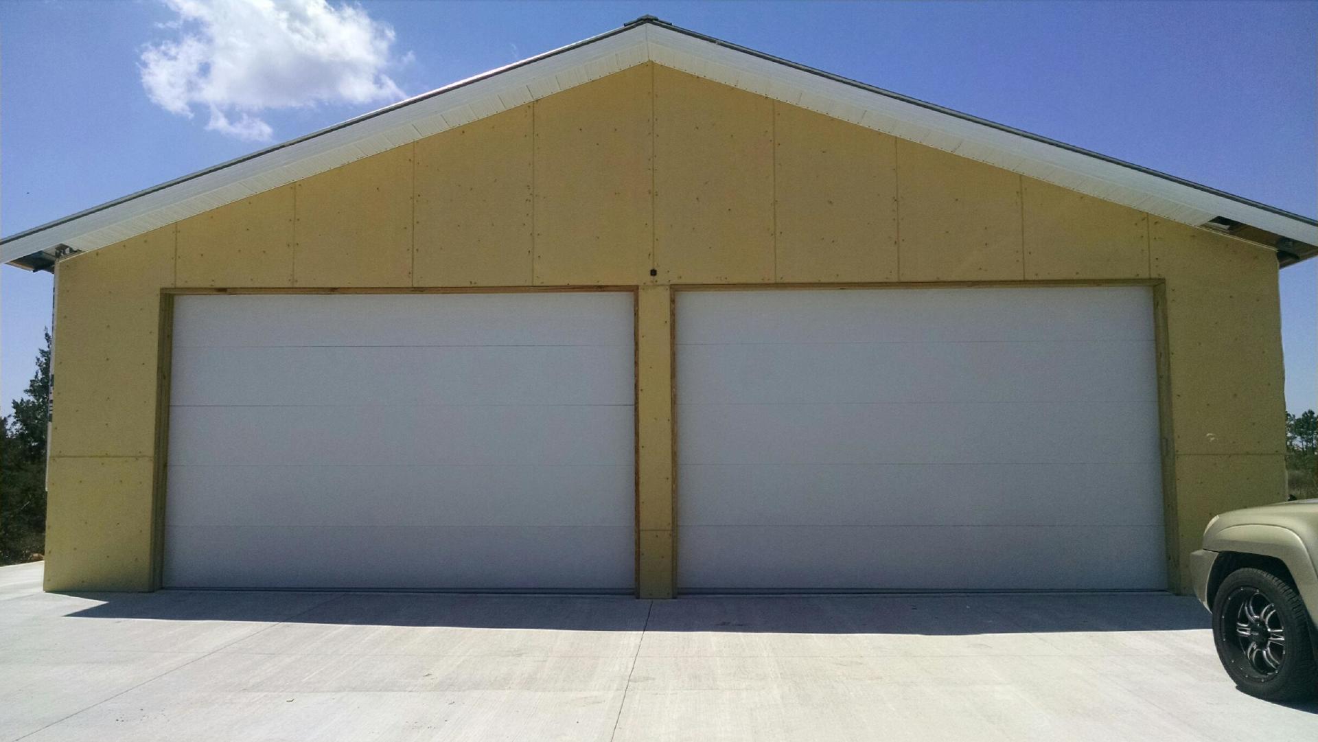 twin white garage doors