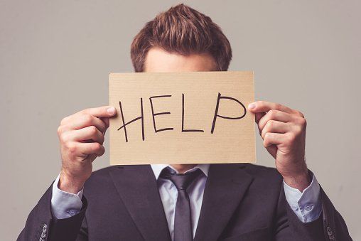 Man with signage help — Bankruptcy Attorney in Mobile, AL