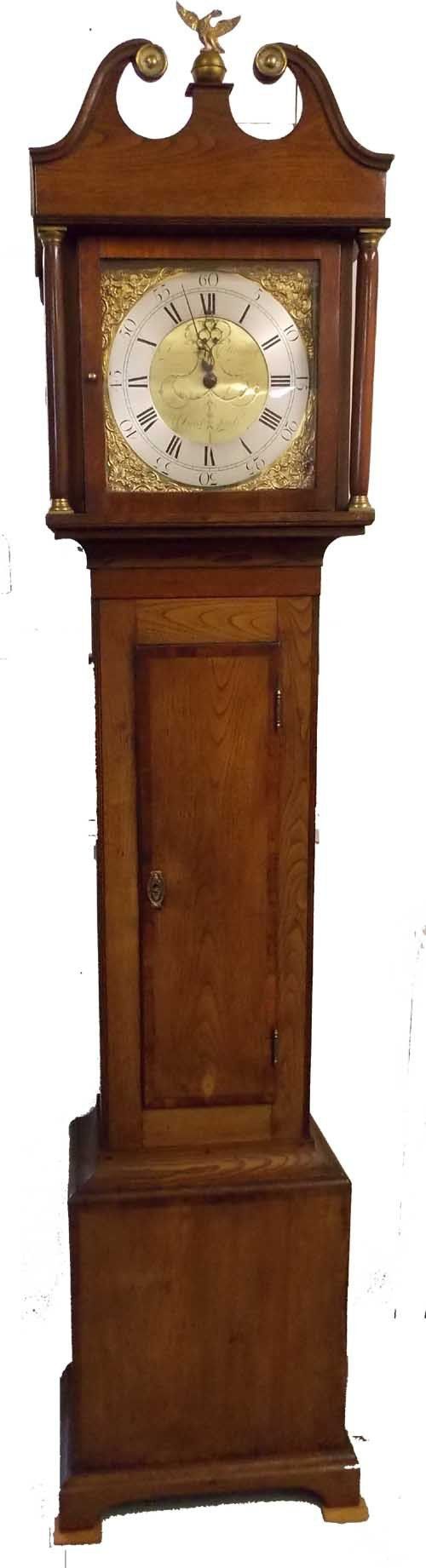 square dial clock on a wooden casing