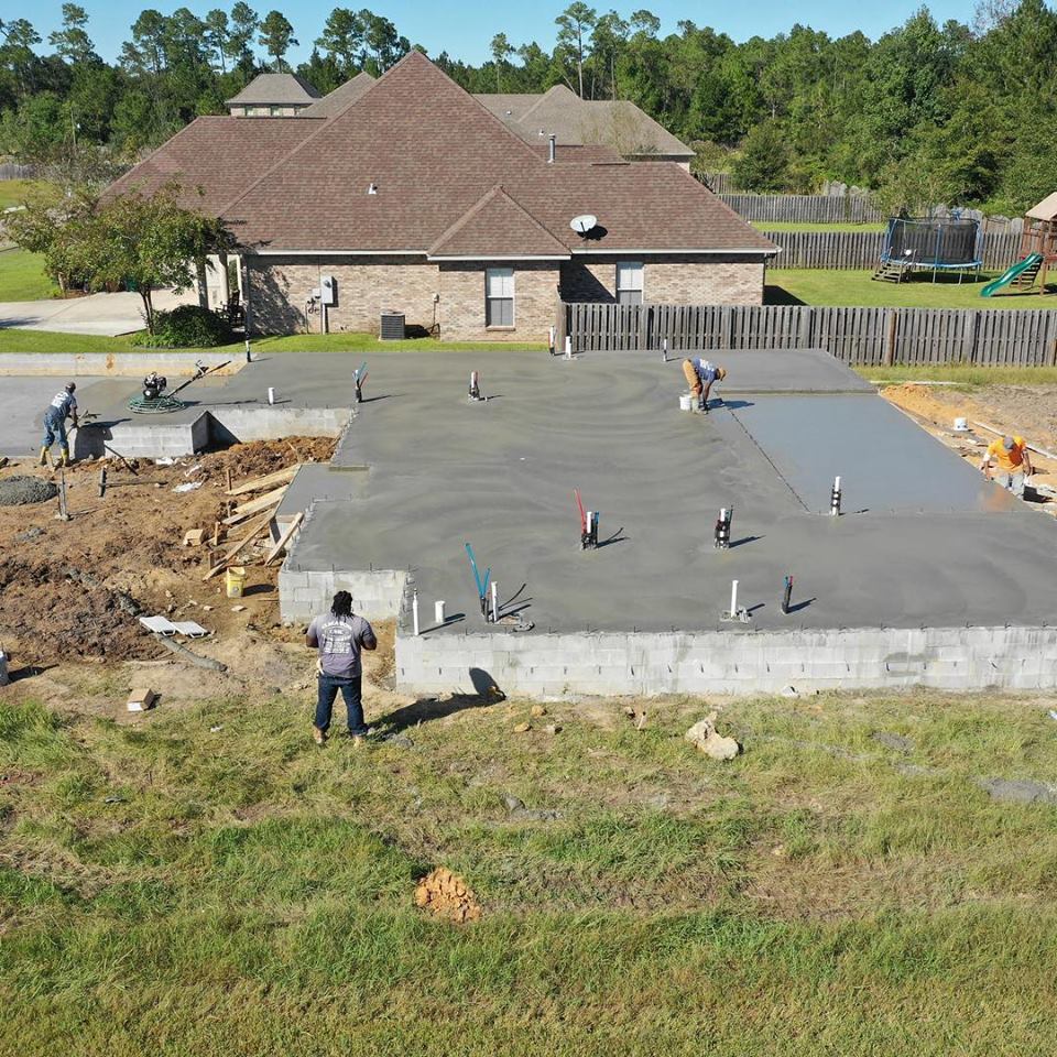 Men Finishing Cement with Edging Tool — Biloxi, MS — C. Mason Concrete