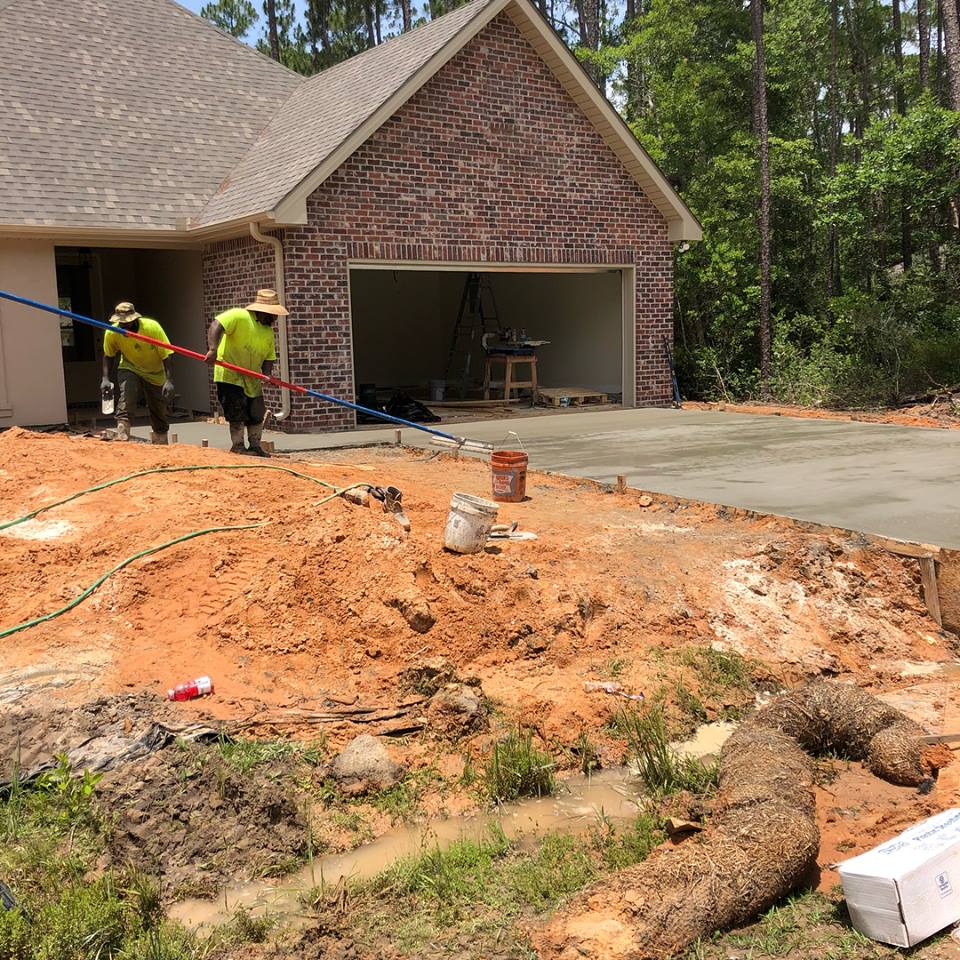 Bull Float and Freshly Poured Concrete — Biloxi, MS — C. Mason Concrete