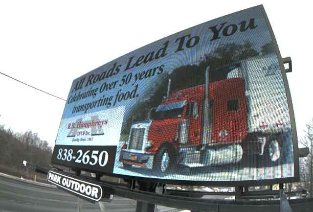 Truck Equipment — Maroon Truck With Company Logo in Rome, NY