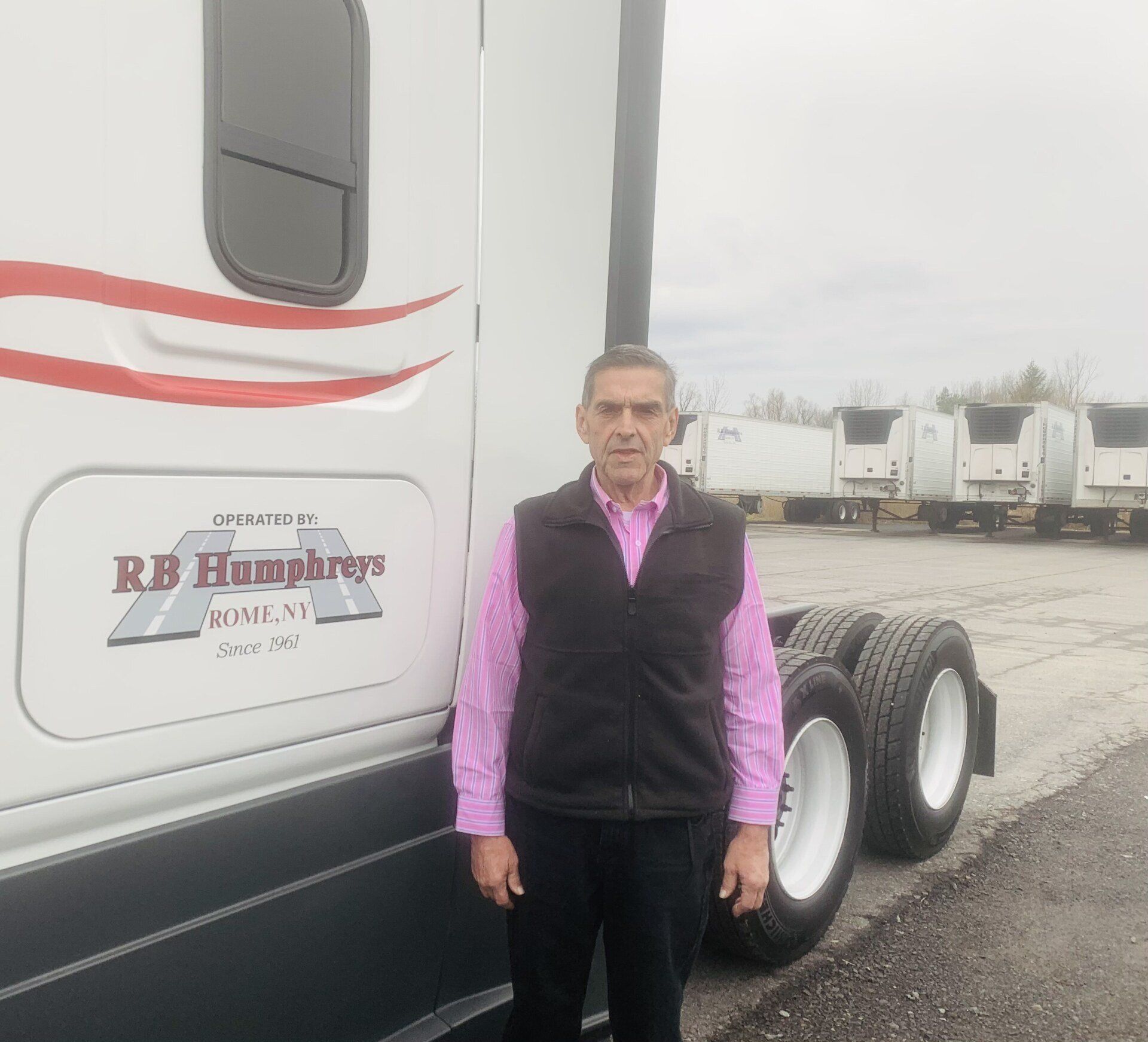 Man Standing Beside Truck — Rome, NY — R.B. Humphreys, Inc.